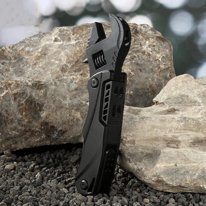 This mini multi-functional tool combines a wrench, screwdriver, folding knife, and saw, making it suitable for outdoor activities and household tasks. It's a convenient combination of essential hand tools