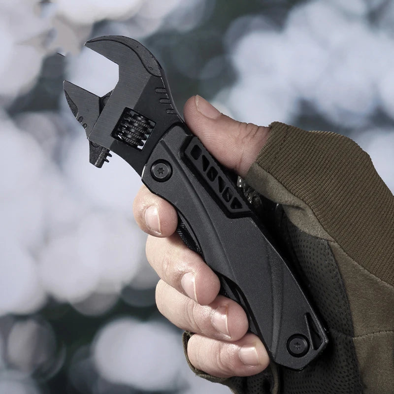 This mini multi-functional tool combines a wrench, screwdriver, folding knife, and saw, making it suitable for outdoor activities and household tasks. It's a convenient combination of essential hand tools