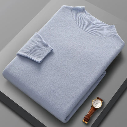 Ce pull pour homme est confectionné en 100 % pure laine et présente un col montant et des manches longues tricotées. C'est un pull basique de couleur unie qui incarne la mode décontractée et sert de haut polyvalent pour les hommes.