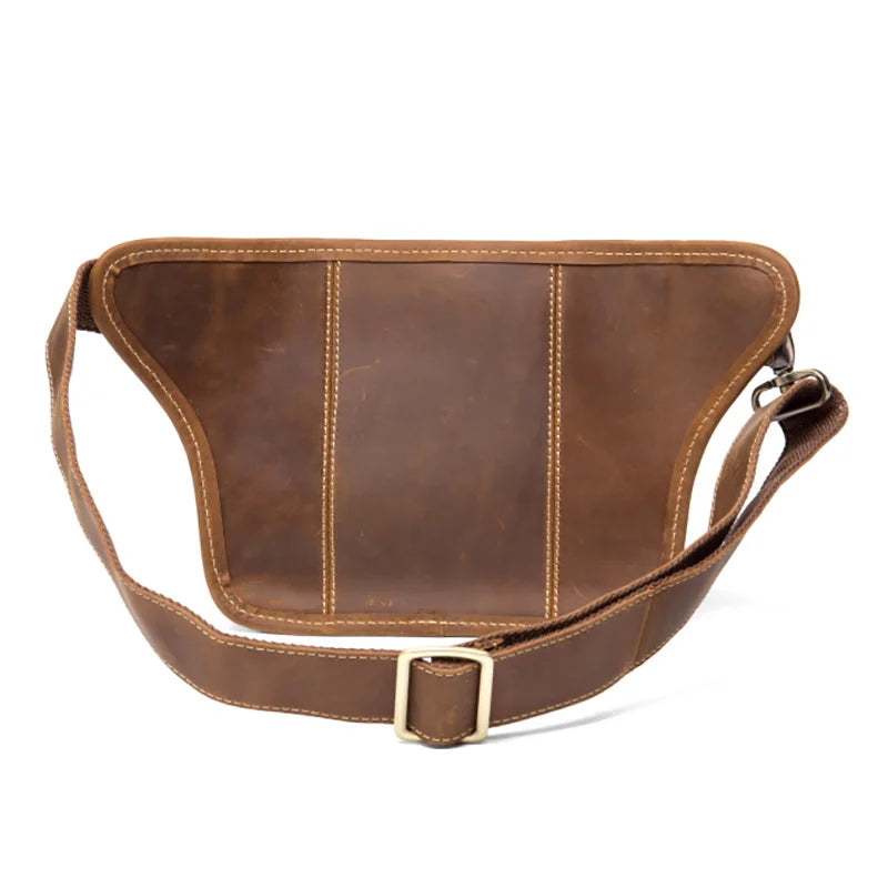 This vintage fashion leather waist bag from 2023 is a genuine leather sling bag designed for men. It serves as a chest bag, waist pack, or sling bag, offering both style and functionality